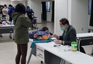 サポーター活動の様子（子ども服無料頒布会）